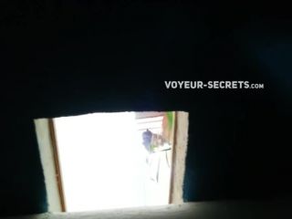 Careful voyeur spied a showering woman-1