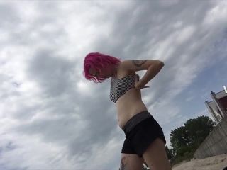 Punk girl changes her top in public-1