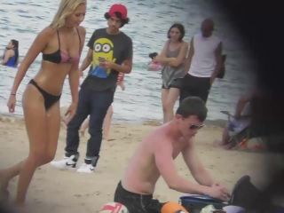 Silly blond girl gets dirty on beach-3