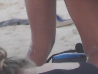 Silly blond girl gets dirty on beach-9