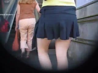 Short skirt spied on the moving  stairs-2