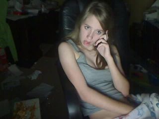 Cute blonde teen playing with titts and pussy on the phone webcam-5