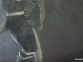 Girl in zentai spandex bodysuit sggles for air in underwater bondage-9