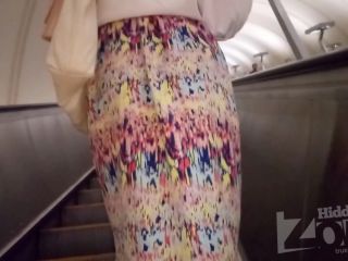 Hidden-Zone.com- Up3046 Upskirt for slim tanned girl with long multi-colored skirt. Our cameraman spent a long time -2