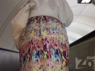 Hidden-Zone.com- Up3046 Upskirt for slim tanned girl with long multi-colored skirt. Our cameraman spent a long time -3