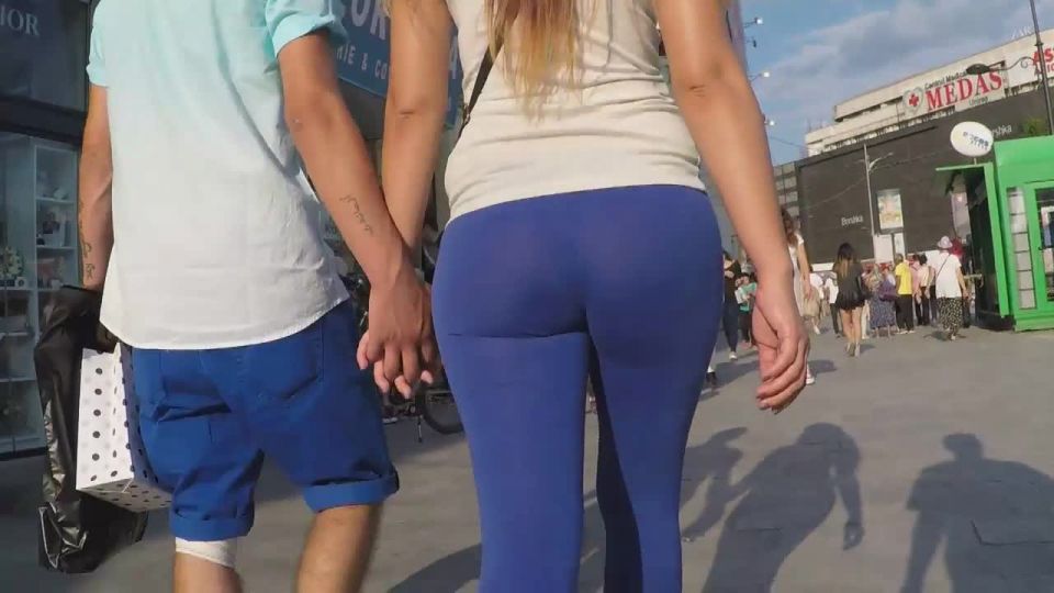 Sexy kitten in skin tight blue leggings