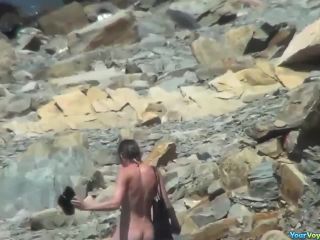 Nudists at the rocky beach-4