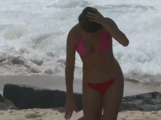 Hot teen in red thong bikini on beach with family-6