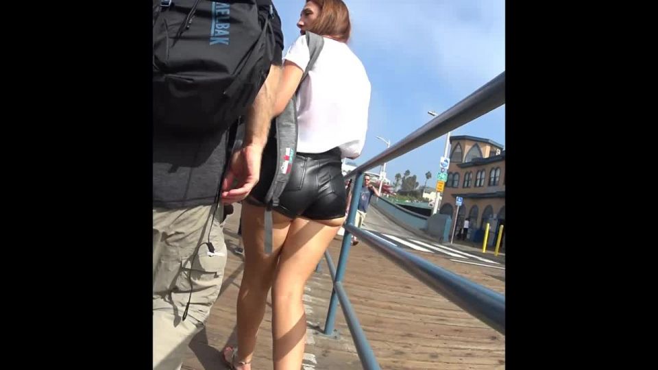 Tight leather shorts all the way inside butt crack