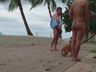 Hot girls play with dog by the beach-9