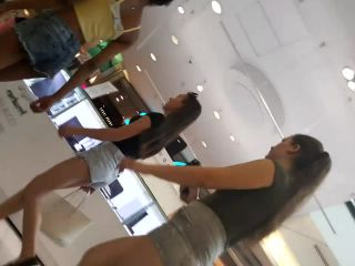 Skinny black girl and white teen at mall-2