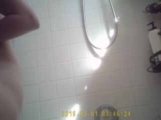 Girl bends over right in front of hidden shower cam!-2