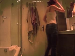 cute slim girl undressing and changing tampon in the bathroom. hidden ...-0