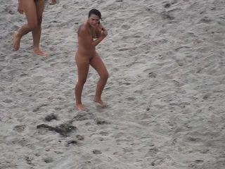 Nude beach, amateur girl shows tits and pussy-5