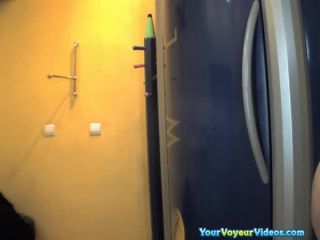 Chubby brunette undressing in tanning  room-2