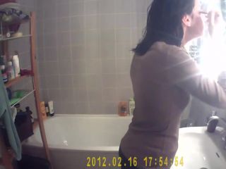 Hot girl's tits spied while washing  teeth-6