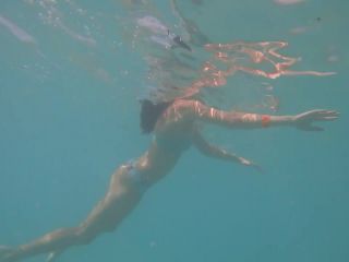 Voyeur swims close to hot teen girl-5