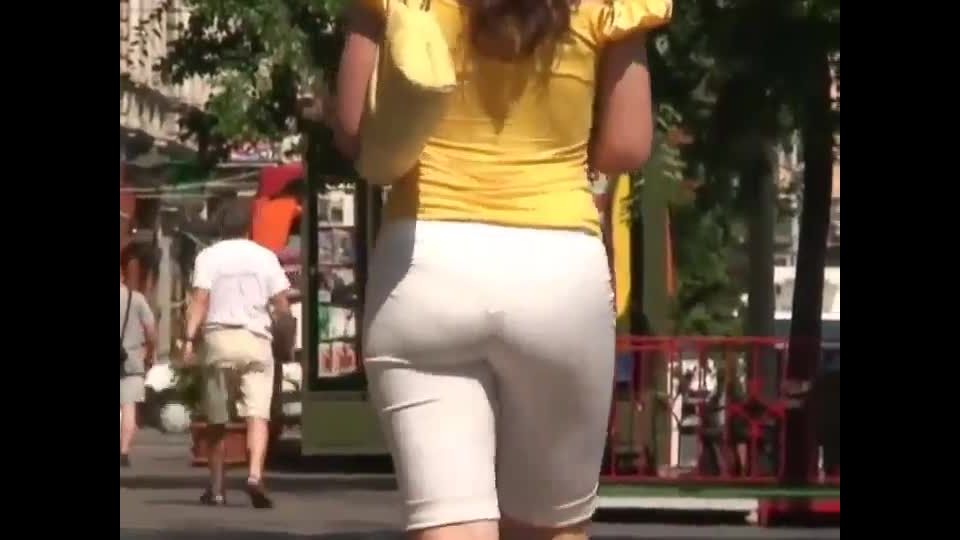 Following a big butt in white  pants