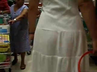 Thong peeks through her white  dress-2