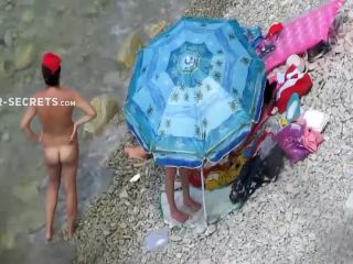 Spying a nudist family on the  beach-1