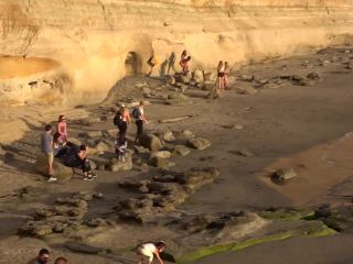 Teen girls making selfies on beach-5