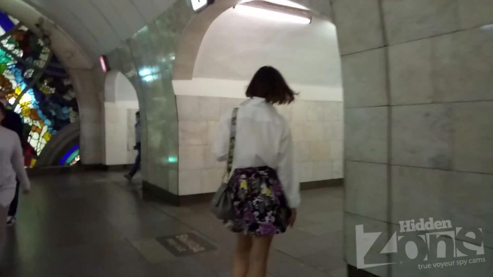 Hidden-Zone.com- Up3050 Upskirt to a slender girl in a short multi-colored skirt. The lens of our hidden camera got 