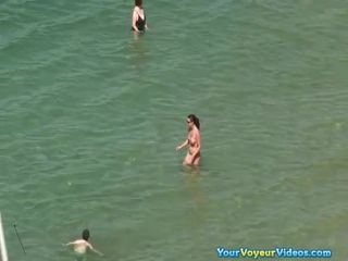 Topless women at beach-0