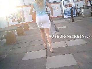 Blond businesswoman in tight white skirt-1