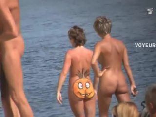 Funny smiling pumpkin on a naked ass-0
