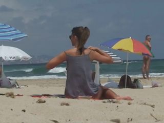 Stunning girl gets naked on beach-9