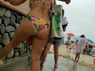 Curvy milf peeped while she enjoys the beach-7