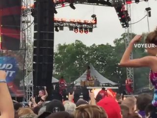 Hot girl flashes tits during a concert-0