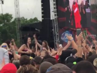 Hot girl flashes tits during a concert-2