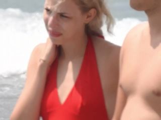 Blonde's hot pussy bulge in swimsuit-0