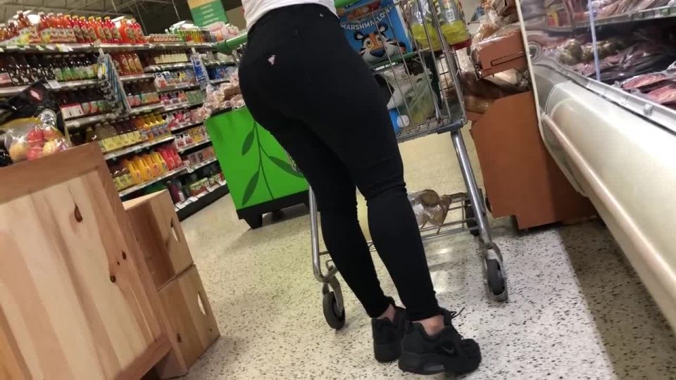 Big butt cheeks in very tight jeans