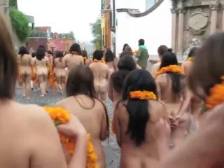 Public nudity with orange flowers on the street-7