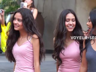 Beautiful twin sisters in matching pink  dresses-2