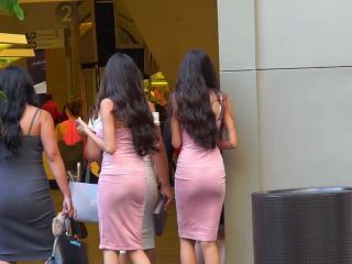 Beautiful twin sisters in matching pink  dresses-9