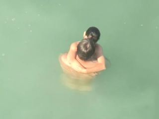 Spying two teenagers fuck in the water-1