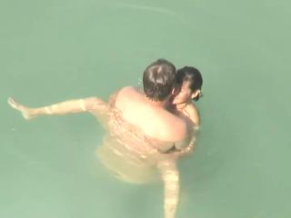 Spying two teenagers fuck in the water-5