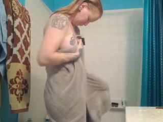 hot redhead tattooed girl after shower. hidden cam-0