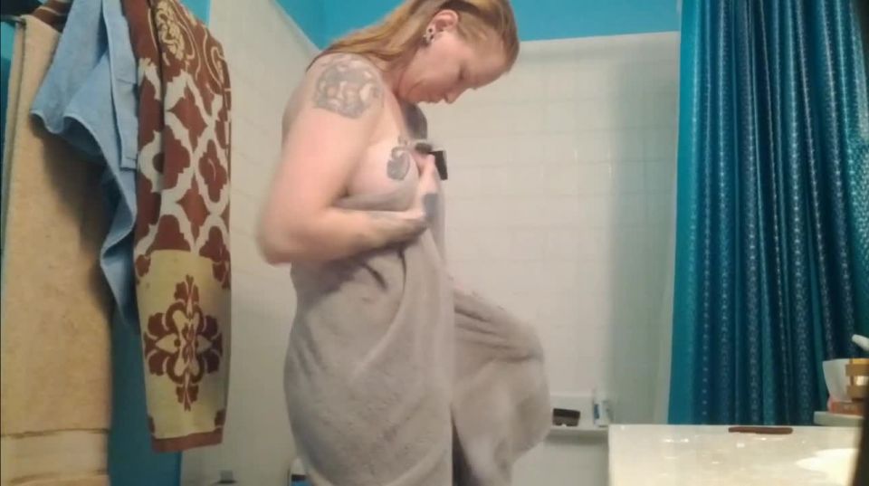 hot redhead tattooed girl after shower. hidden cam