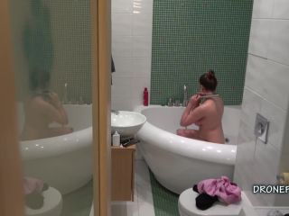 Chubby busty girl taking shower. hidden cam-5