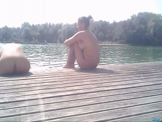 Nude women sunbathing by the lake-3