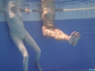 Two chicks naked in pool-1