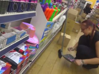 Store clerk bending over in front of  me-8